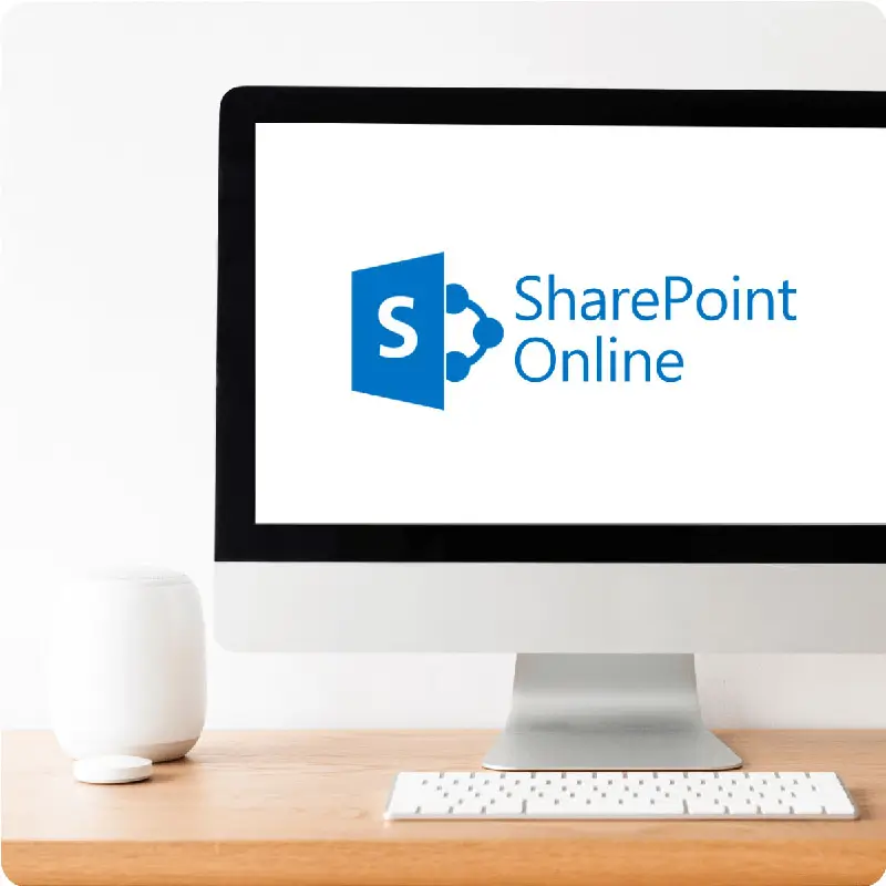 Desktop computer with Sharepoint Online logo displayed